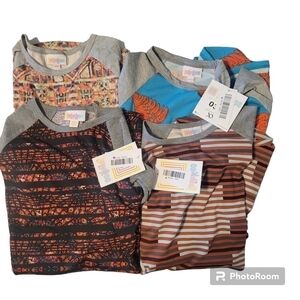 4 XXS LuLaRoe shirts (3 NWT & 1 preowned)